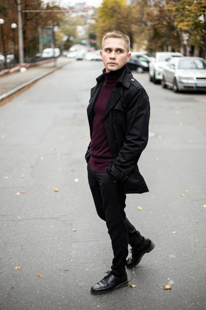 istock Stylish man in black trenchcoat 1206046168