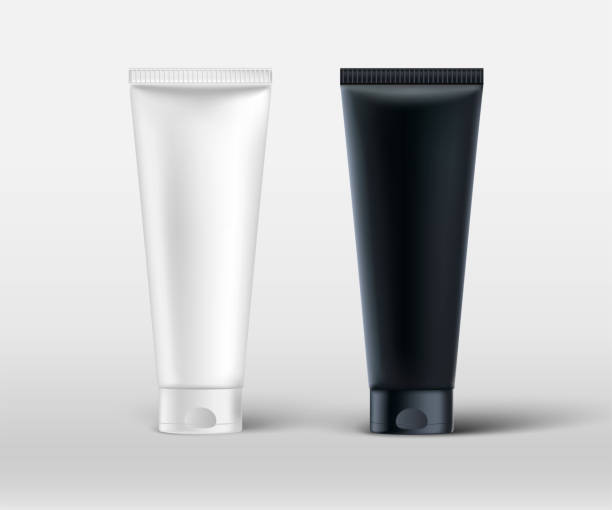 istock Black and white 3d realistic cosmetic tubes isolated on white background. Vector cosmetic packages mock up 1206046321