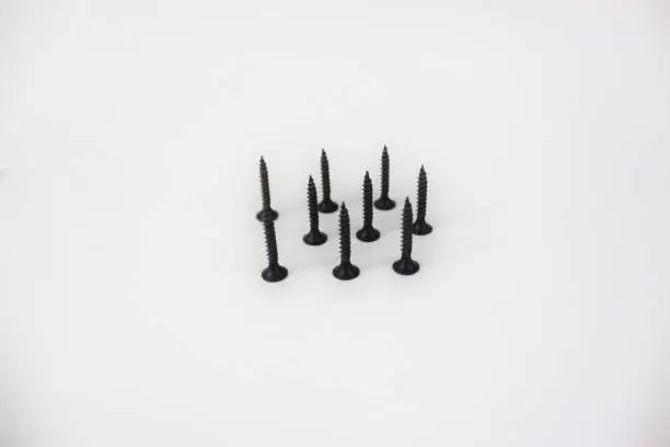 Self-driving black screw set isolated on white background