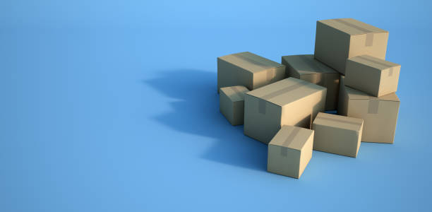 istock Pile of cardboard boxes on blue background 1206052778