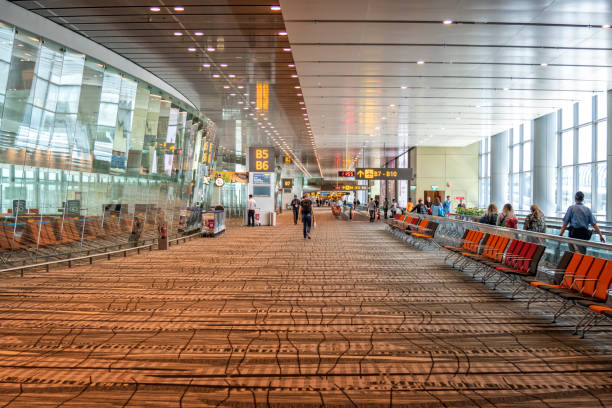People walking inside Changi International Airport in Singapore.