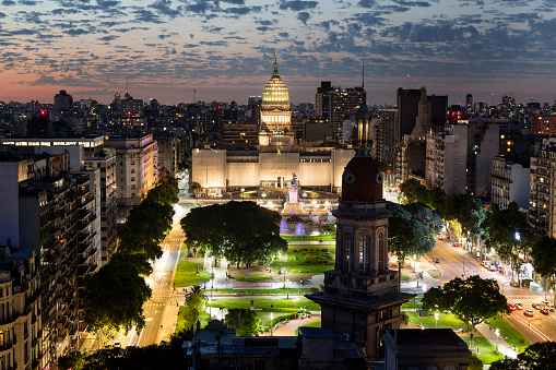 Argentine Parliament and cityscape of Buenos Aires at dusk, aerial view.