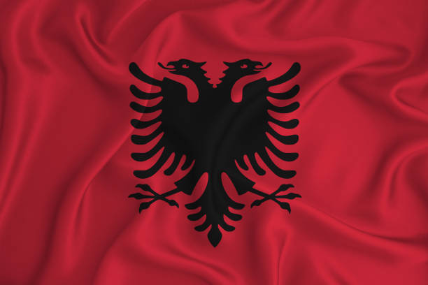 istock albaniya flag on the background texture. Concept for designer solutions. 1206054975