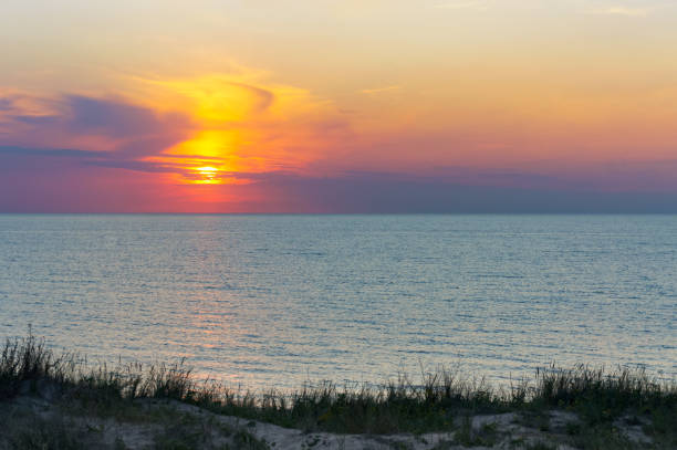 istock sea waves red from sunlight, sunset on the sea 1206056725