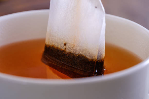 istock Fragrant and tasty tea in a cup close-up 1206057705