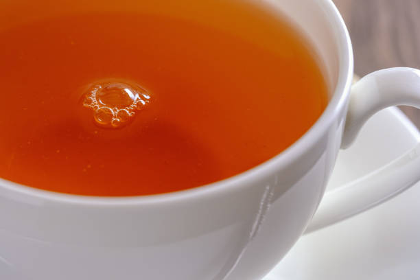 istock Fragrant and tasty tea in a cup close-up 1206057731