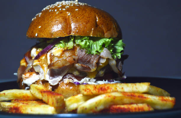 istock Burger with French fries 1206057832