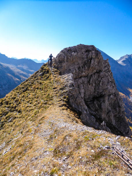 istock Grosse Gamswiesenspitze - A man hiking in high mountains 1206060328