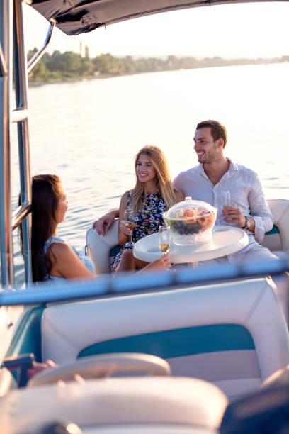 istock Friends having fun on the boat 1206061407