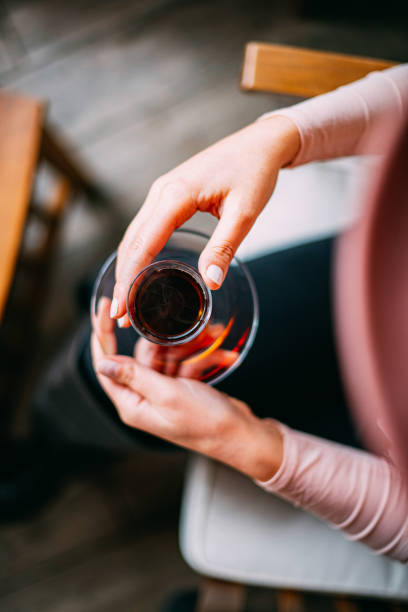 Woman Holding Turkish Tea