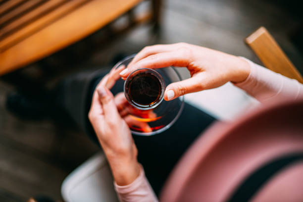 Woman Holding Turkish Tea