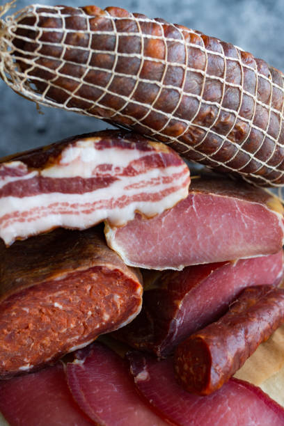 istock Different types of pork products sausages, ham, bacon 1206066974