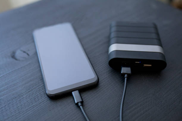 istock USB charger plugged in to smart phone 1206070935