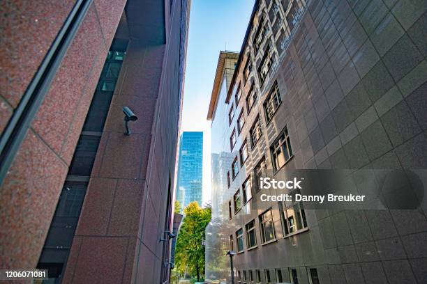 View Of Deutsche Bank Tower Through The Street Stock Photo - Download Image Now - Apartment, Architecture, Blue