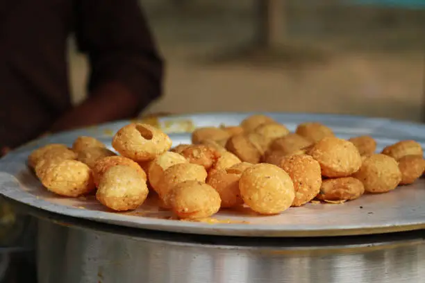 Photo of Fusca Chotpoti is Popular street food of Bangladesh and India. this food Looks like chips.a roadside shop Indian bengali food dish and pot.Testy and lucrative food.The dish consists mainly of potatoes