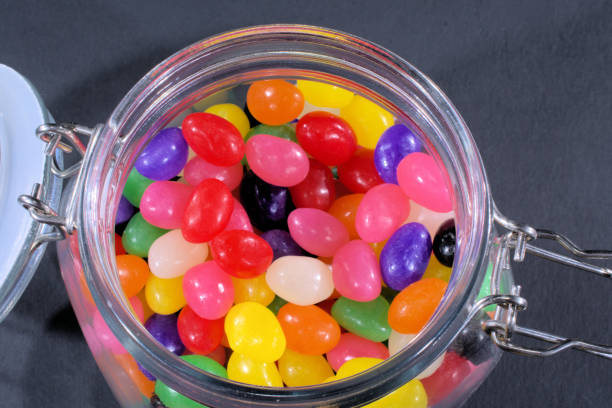 istock Open lid of jellybean jar 1206071998