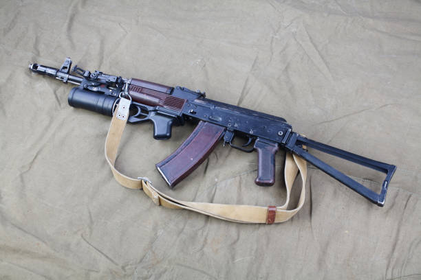 istock Kalashnikov AK 74 with underbarrel grenade launcher on canvas 1206072613