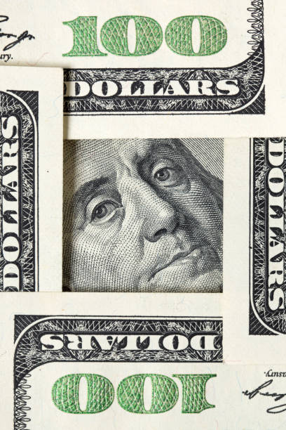 istock Square made of $100 bills with Benjamin Franklin inside 1206072678