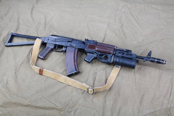 istock Kalashnikov AK 74 with underbarrel grenade launcher on canvas 1206073021