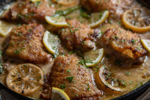 istock lemon butter chicken in iron skillet 1206073825