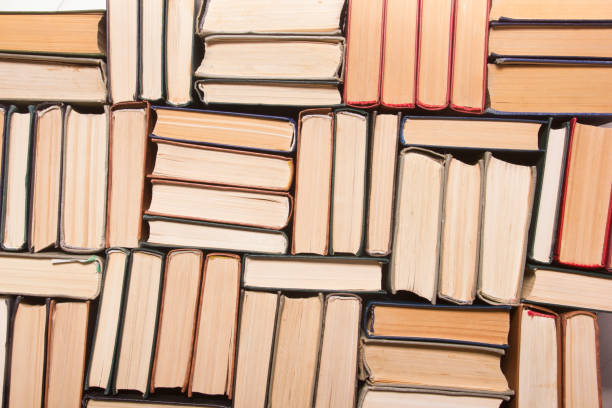 istock Old and used hardback books or text books from above. 1206073867