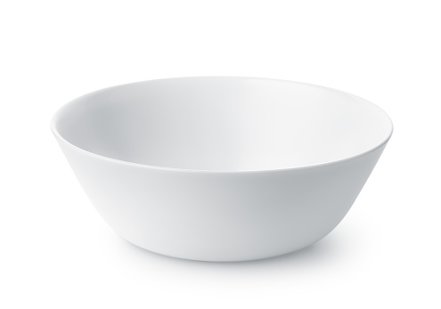 White empty ceramic bowl isolated on white