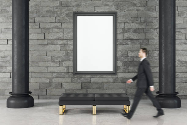 istock Businessman walking in gallery interior 1206075659