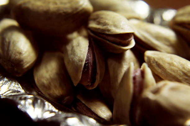 istock pistachios nuts close-up and macro photos 1206077588