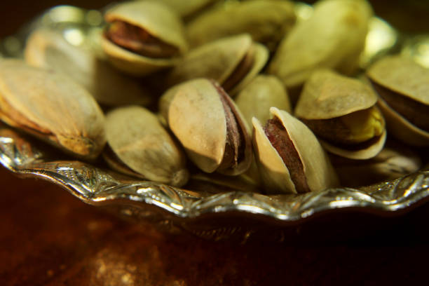 istock pistachios nuts close-up and macro photos 1206077681