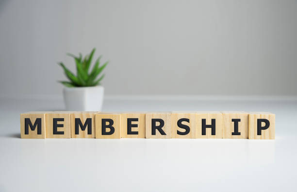istock focus on wooden blocks with letters making Membership text. Concept image. 1206098300