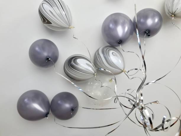 Gray colored balloon for decoration in the party stock photo