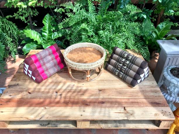 istock Pillow on wooden bench in relaxation area 1206101647