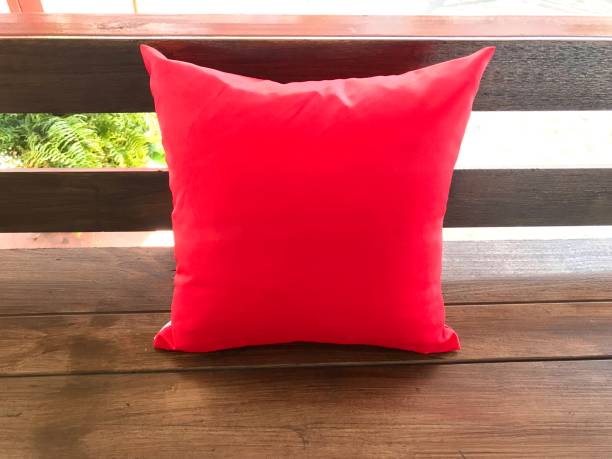 istock Pillow on wooden bench in relaxation area 1206101815