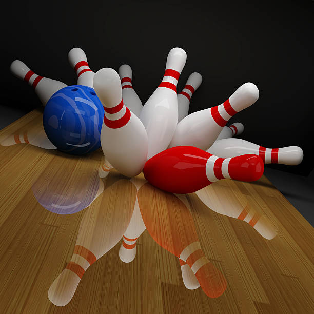 istock An image of a royal blue bowling ball achieving a strike 120610396