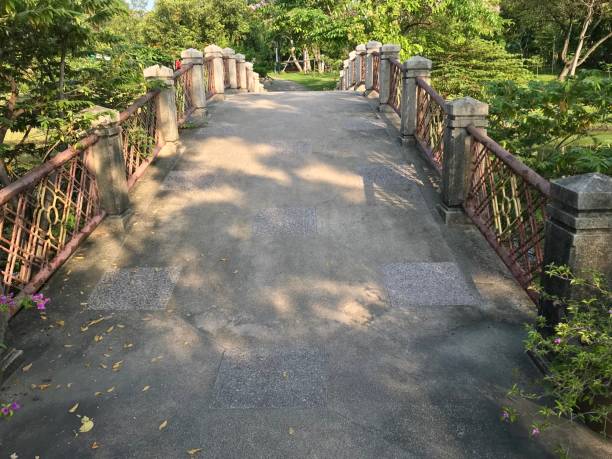 istock Cement bridge over the lake 1206104390