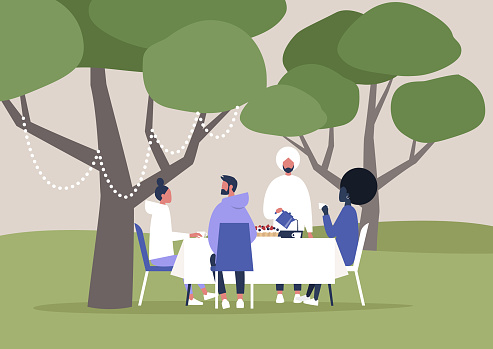 a diverse group of friends having lunch in nature, beautiful landscape, tea time