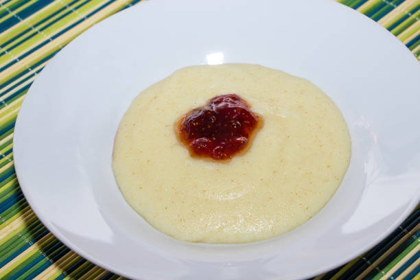 Semolina with jam on a green bamboo background