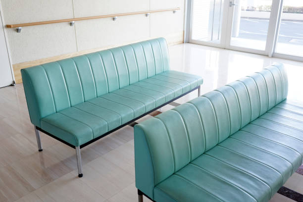 istock Hospital waiting room with empty chairs 1206116123