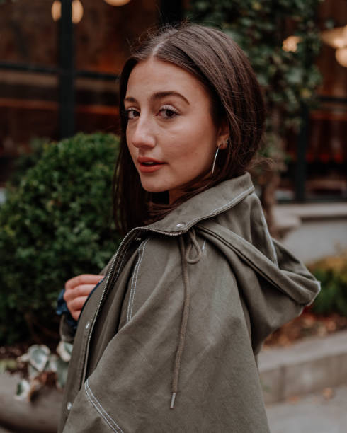 istock Young beautiful woman looking at the camera 1206123659
