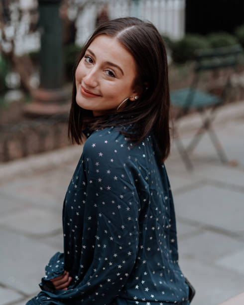 istock Young beautiful woman looking at the camera 1206123680
