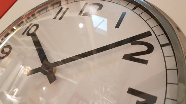 istock clock time  on  the wall  isolated for  background 1206125888