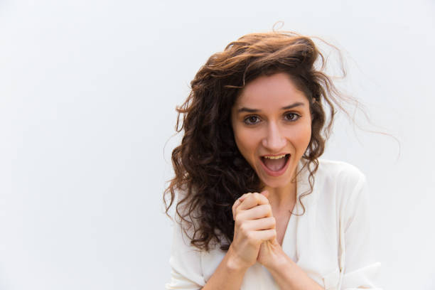 istock Successful young woman holding hands together 1206137203