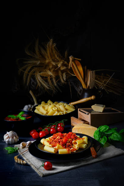 istock Rigatoni pasta with Bolognese sauce and fresh basil 1206141553