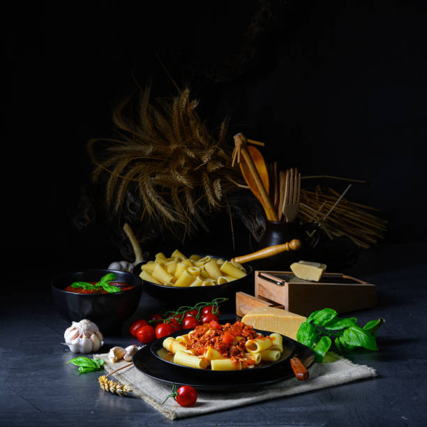 istock Rigatoni pasta with Bolognese sauce and fresh basil 1206141557