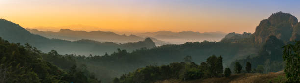 istock Beautiful forest mountains with white fog. Panorama View 1206142767