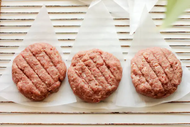 Photo of Plant based meat concept. Vegetable burger patties. First non-soy plant meat