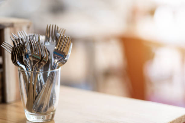 istock Many fork are placed with In the glass on the dining table decoration in hotel 1206145413