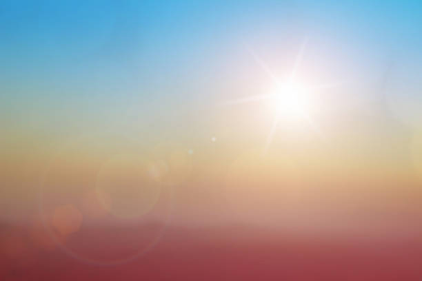 istock Natural background blurring warm colors and bright sun light. Bokeh or Christmas background Green Energy at sky sunny color orange light patterns plain abstract flare evening clouds blur. 1206149381