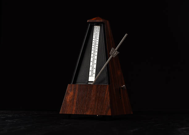 istock Metronome isolated with pendulum swinging 1206151377