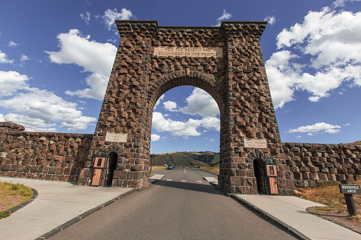 The Roosevelt Arch at the Entrance of Yellowstone National Park. The Roosevelt Arch inscribed with 